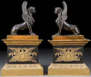 A PAIR OF FRENCH EMPIRE PERIOD PATINATED AND GILT