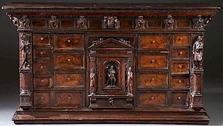 AN ITALIAN FIGURAL CARVED WOOD BAMBOCCI CABINET