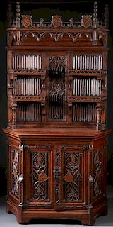A CARVED GOTHIC STYLE OAK CABINET, 19TH CENTURY