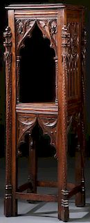 AN INTERESTING CARVED, GOTHIC STYLE STAND WITH