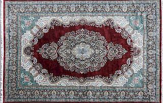 AN ISPHAHAN ROOM SIZED HAND WOVEN ORIENTAL CARPET