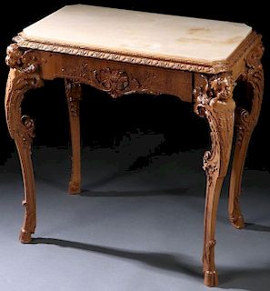AN ITALINATE CARVED MAHOGANY AND ONYX PARLOR