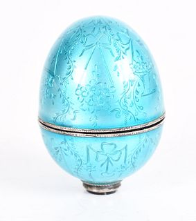 A Silver and Enamel Egg Form Etui