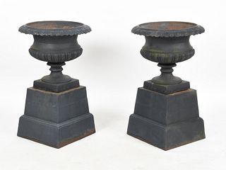 A Pair of Neoclassical Style Cast Iron Garden Urns
