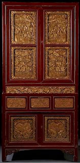 A FINE CHINESE CARVED AND GILT WOOD CABINET