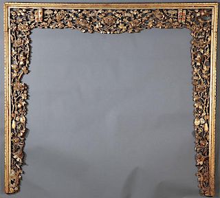 CHINESE CARVED AND GILT WOOD SURROUND