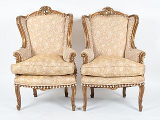 Pair of Rococo Style Carved Giltwood Bergeres