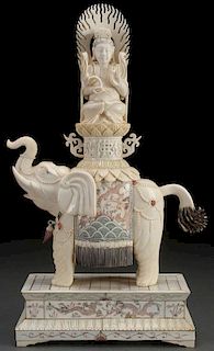 A CHINESE CARVED IVORY FIGURAL GROUP, CIRCA 1925