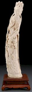 A LARGE CHINESE CARVED IVORY “KWAN-YIN” TUSK