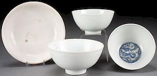 FOUR CHINESE WHITE GLAZED POTTERY BOWLS, QING
