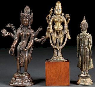 A GROUP OF THREE BRONZE FIGURES OF BUDDHA