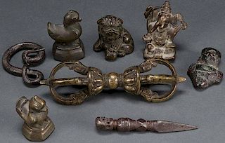 A GROUP OF EIGHT TIBETAN AND CHINESE BRONZE
