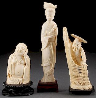 A GROUP OF THREE CHINESE OR JAPANESE CARVED IVORY