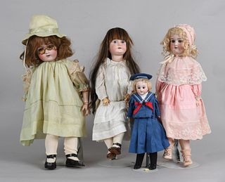 Four Antique Bisque Head Dolls