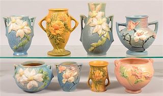 Eight Pieces of Roseville Art Pottery Vases.