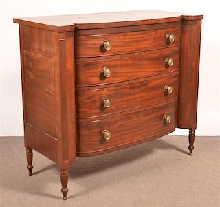 American Sheraton Bow-front Chest of Drawers.