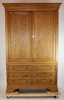 English pine linen press. 2 doors over 6 drawers.