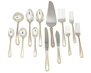 A Kirk and Sons "Golden Winslow" sterling flatware service
