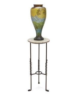 A large Galle-style vase with Art Deco iron table
