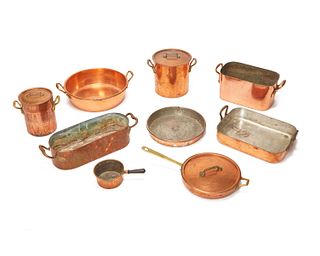 A group of copper cookware