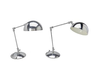 A pair of chrome drafting lamps