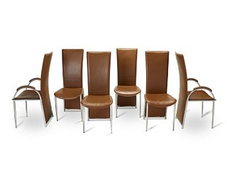 A set of modern leather and chrome dining chairs