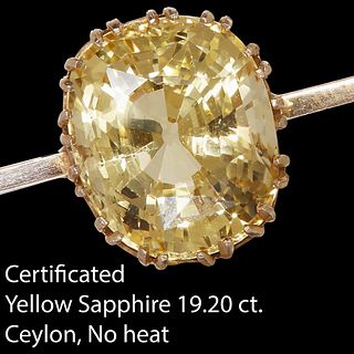 IMPRESSIVE CERTIFICATED YELLOW SAPPHIRE BROOCH