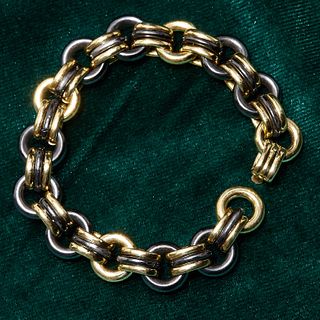 18 ct GOLD AND STEEL BRACELET
