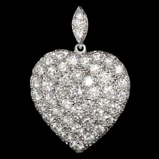 A LARGE DIAMOND SET HEART PENDANT.