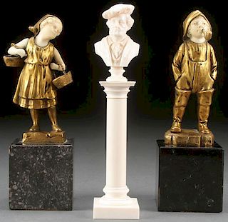 A GROUP OF GILT BRONZE AND IVORY SCULPTURES