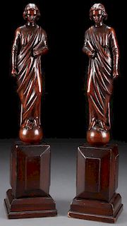 A PAIR OF CONTINENTAL CARVED WOOD FIGURES