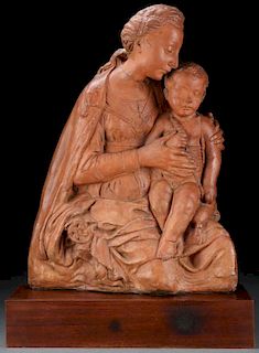 A TERRA COTTA FIGURAL GROUPING OF THE MADONNA