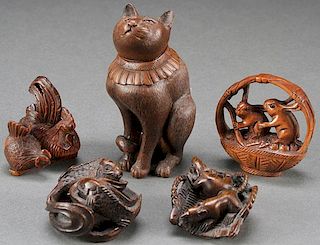 A FIVE PIECE GROUP OF JAPANESE CARVED OKIMONOS