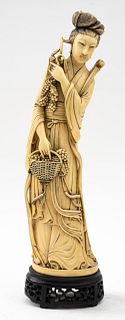 Chinese Resin Sculpture of a Woman with Grapes