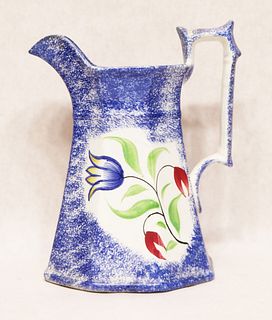 Blue spatterware two-color tulip pattern pitcher