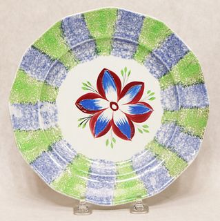 Rainbow spatterware dahlia pattern plate