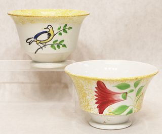 (2) Yellow spatterware unusual bird and thistle pattern cups
