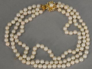 Pearl triple strand necklace with gold diamond and pearl clasp (one strand disconnected). lg. 13 1/2in.