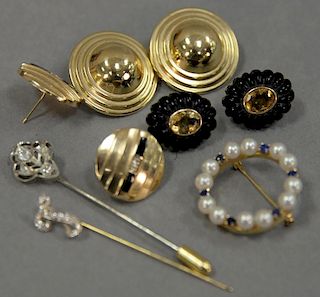 Jewelry lot with two gold and diamond stick pins, three pairs of earrings including two marked 14K, and a circular pin with p