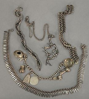 Silver lot with three bracelets including one with charms signed Toncha, two necklaces including one with silver animals mark