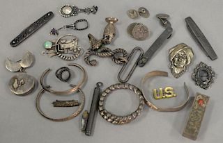 Large lot of mostly silver including jackknives, match holder, bracelets, pins, and more, mostly 19th century.