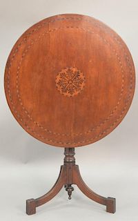 Mahogany inlaid tip top table. dia. 29in.