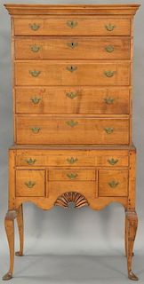 Queen Anne high chest in two parts, having cornice molded top over five drawers on lower section of one long drawer over thre