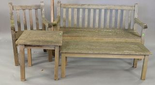 Four teak pieces including bench, armchair, and two tables. bench: lg. 58in.
