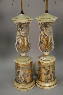 Pair of glass lamps having reverse painted putti and cherub figures. total ht. 36in.