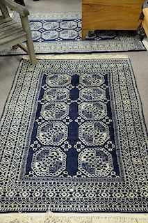Two handmade Oriental throw rugs. 4'2" x 5'8"