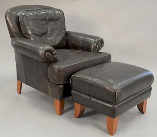 Leather armchair and ottoman.