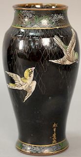Earthenware Oriental vase, background with heavy enameled painted birds, signed on side and having two seal marks on bottom.