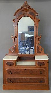 Victorian marble top drop well chest with mirrored back and burl paneled drawer fronts. ht. 87in., wd. 45in.