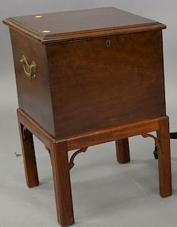 Mahogany cellarette with lift top on Chippendale style base. ht. 25in., top: 16 1/2" x 17"